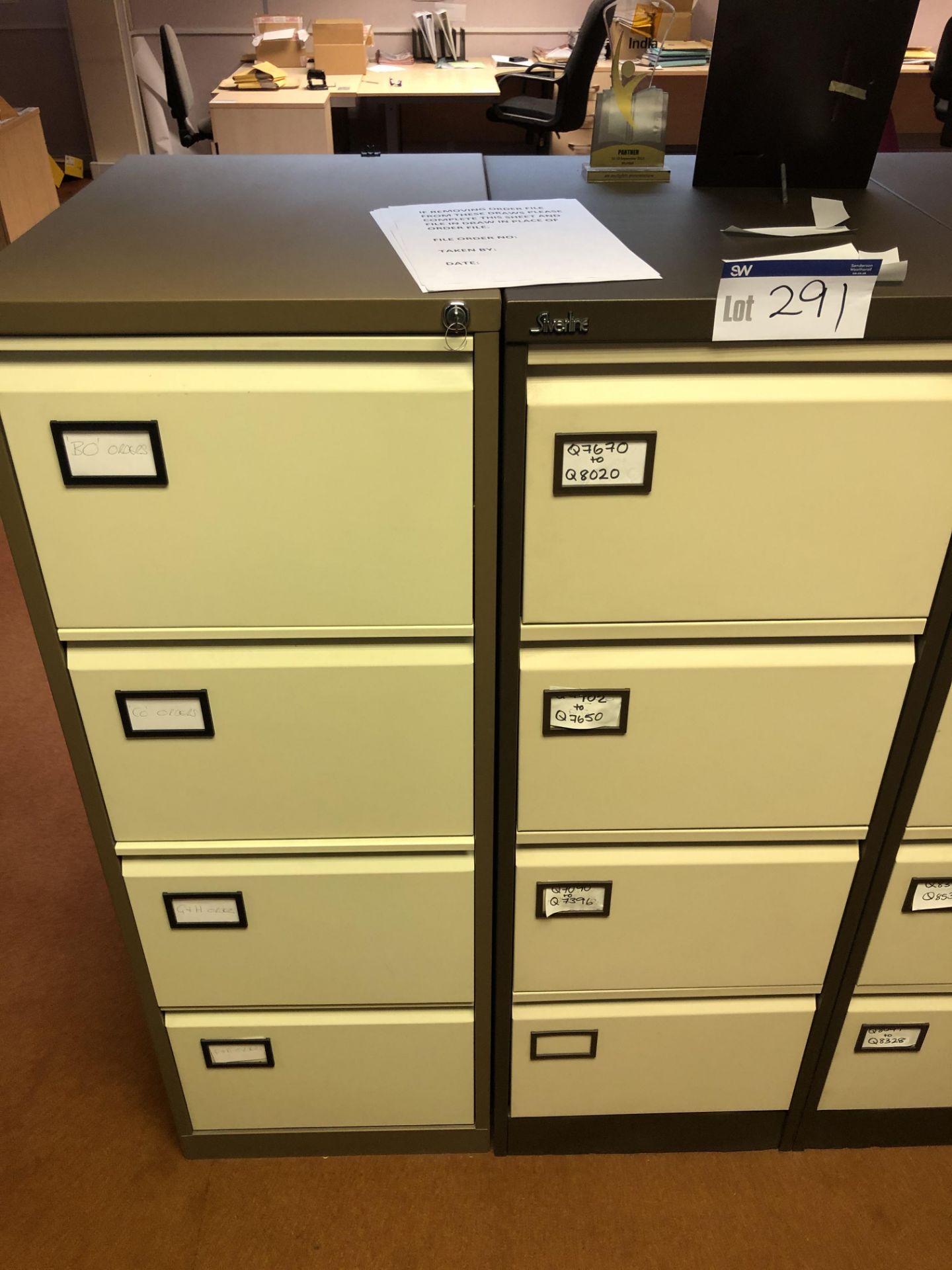 Two Steel Four Drawer Filing Cabinets