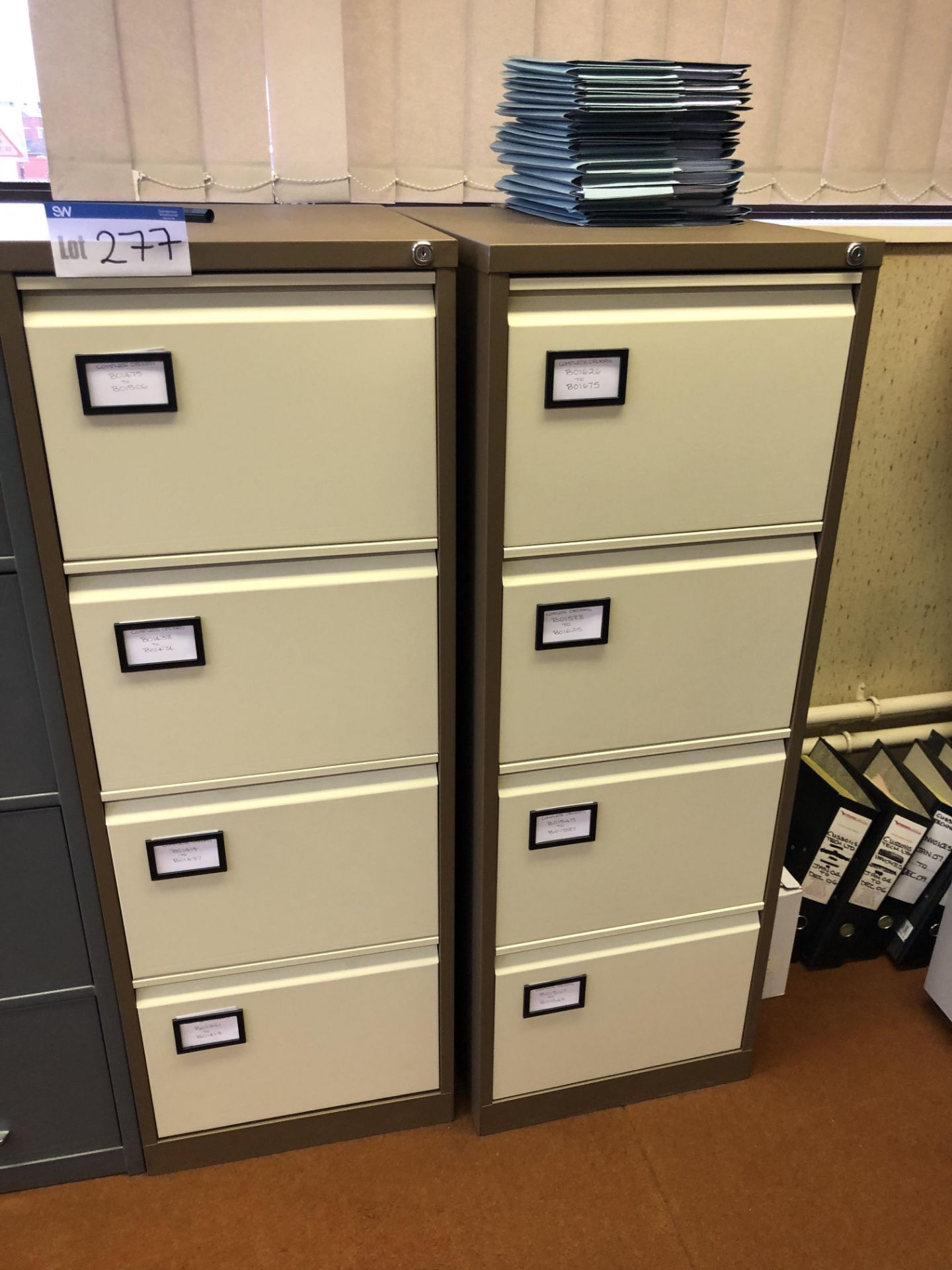 Two Steel Four Drawer Filing Cabinets