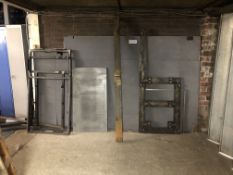 Mixed Metal Frames as set out against the wall