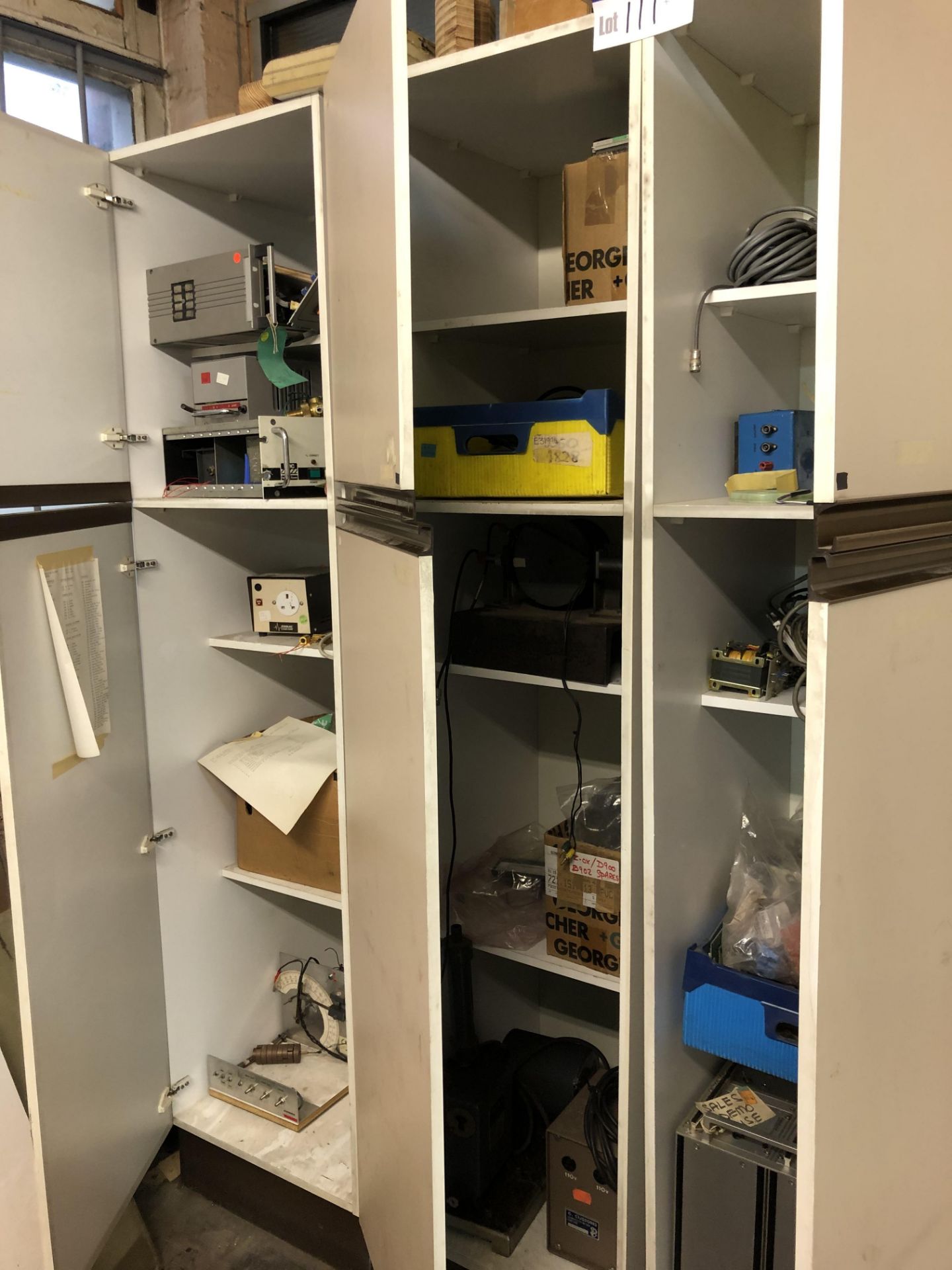 Contents of Three Storage Cabinets, comprising mainly electrical equipment