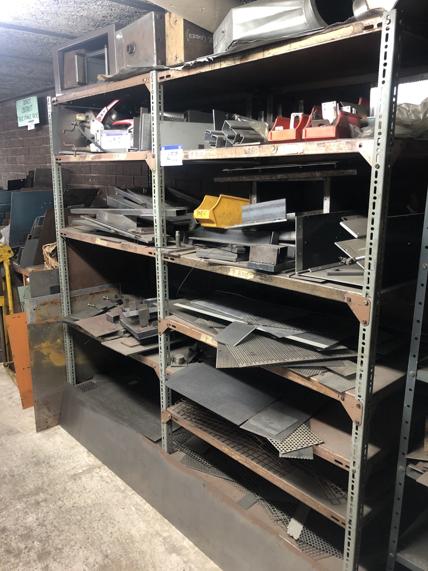 Steel Storage Racking with contents of sheet metal