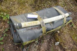 Rubber Tank, marked as 2000 gallon cap.