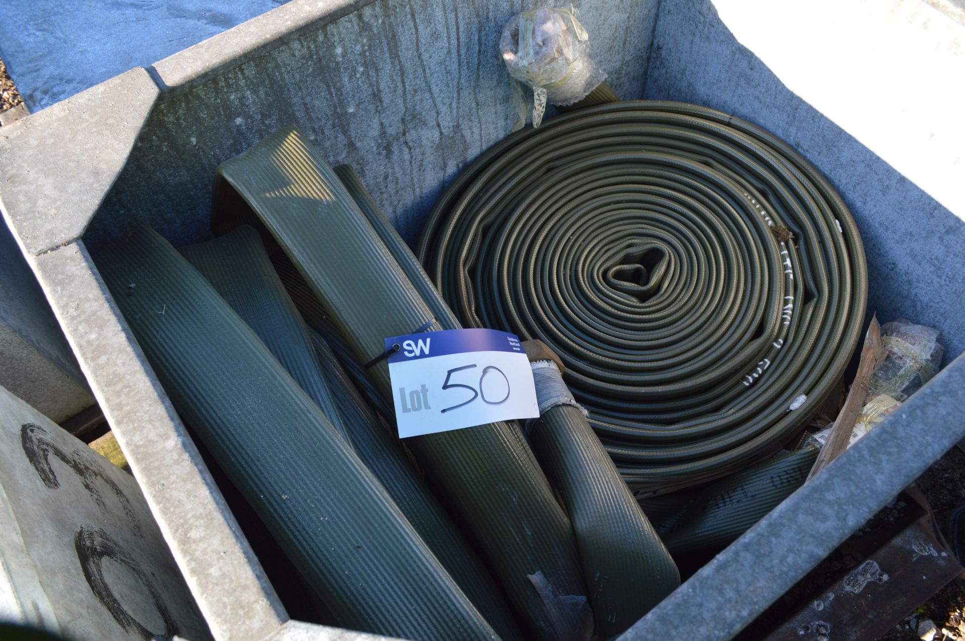 Mainly 100mm Lay Flat Hose, in steel chest (chest