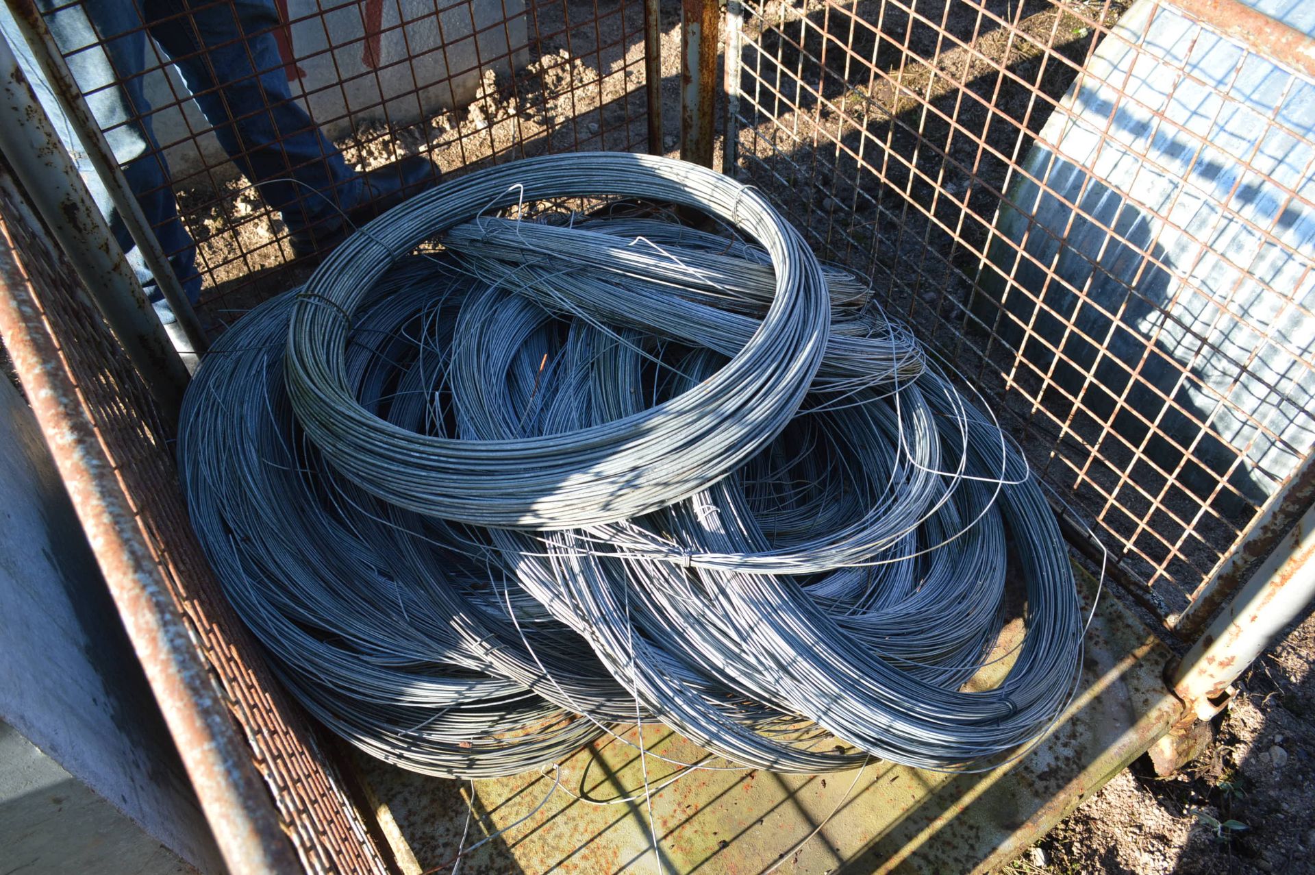 Mainly 2mm dia. Galvanised Steel Wire, in one cage