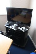 Toshiba 39L232230 39in. Television, with BT television stand and Bush DVD player (remote control for