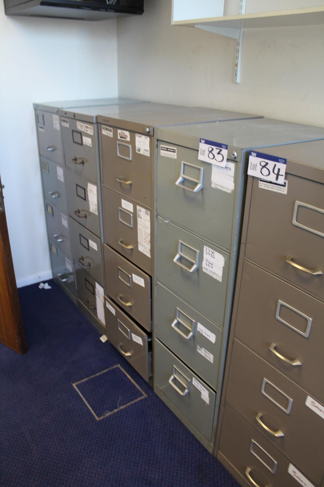 Four Steel Four Drawer Filing Cabinets