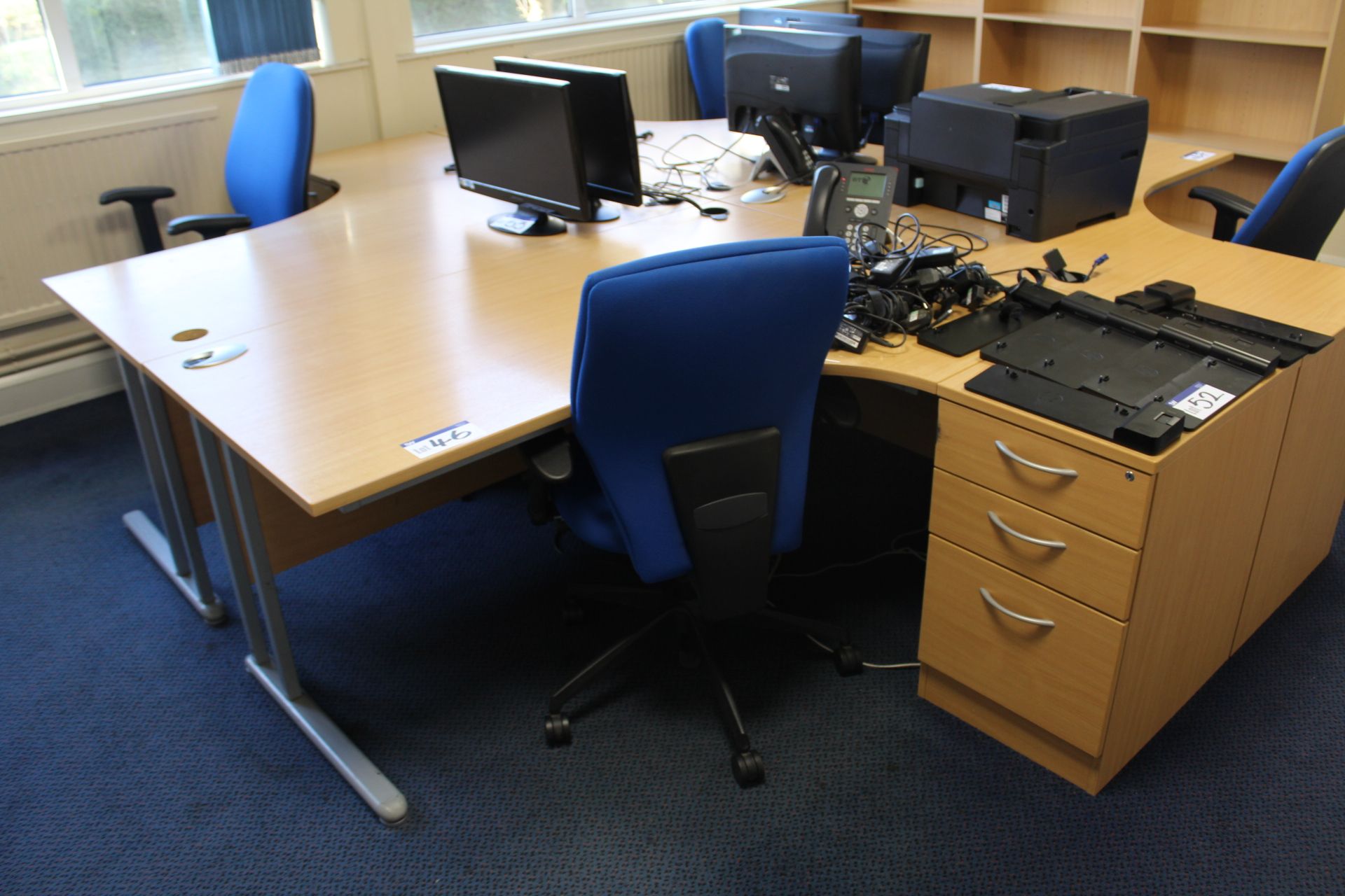 Two Curved Front Light Oak Veneered Cantilever Framed Desks, with two desk pedestals and two