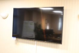 LG 60in. Wall Mounted Television, with remote control