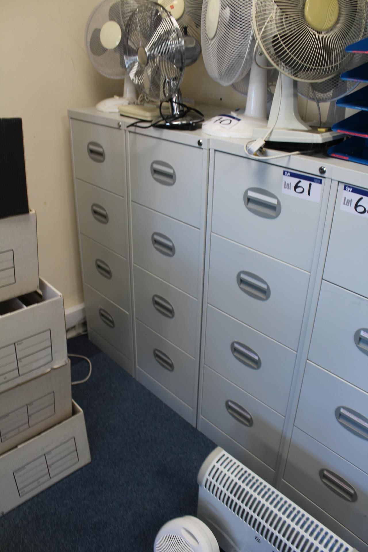 Three Steel Four Drawer Filing Cabinets