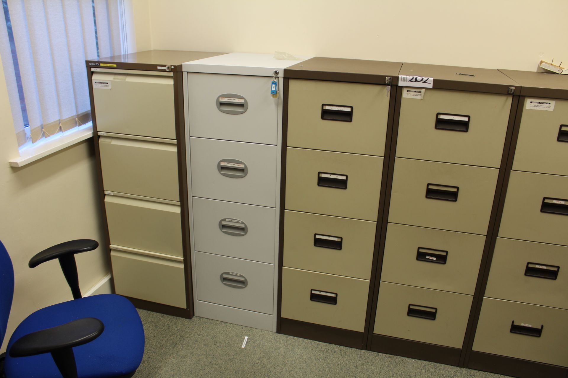 Four Steel Four Drawer Filing Cabinets