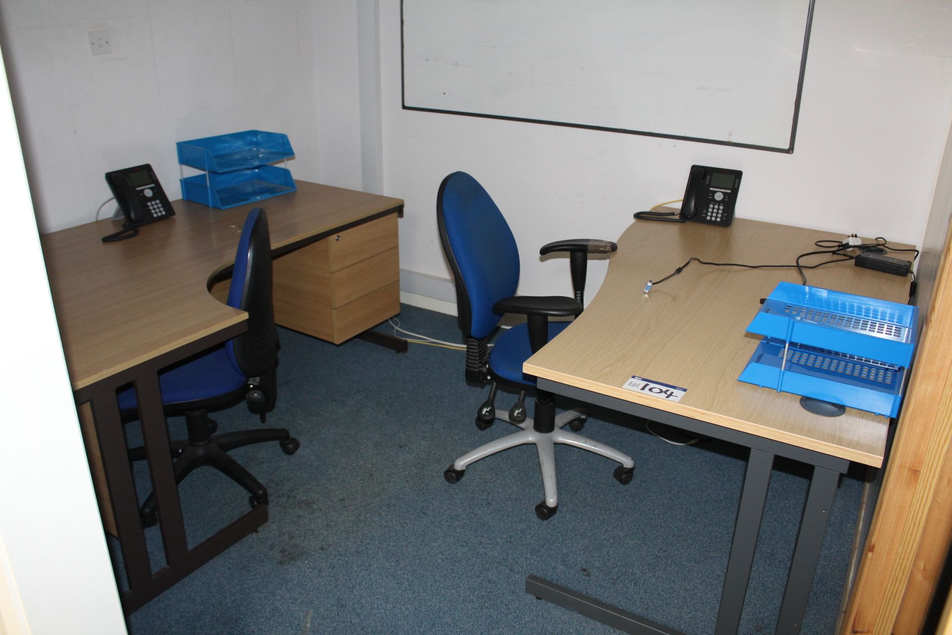 Two Curved Front Light Oak Veneered Cantilever Framed Desks, with two fabric upholstered swivel