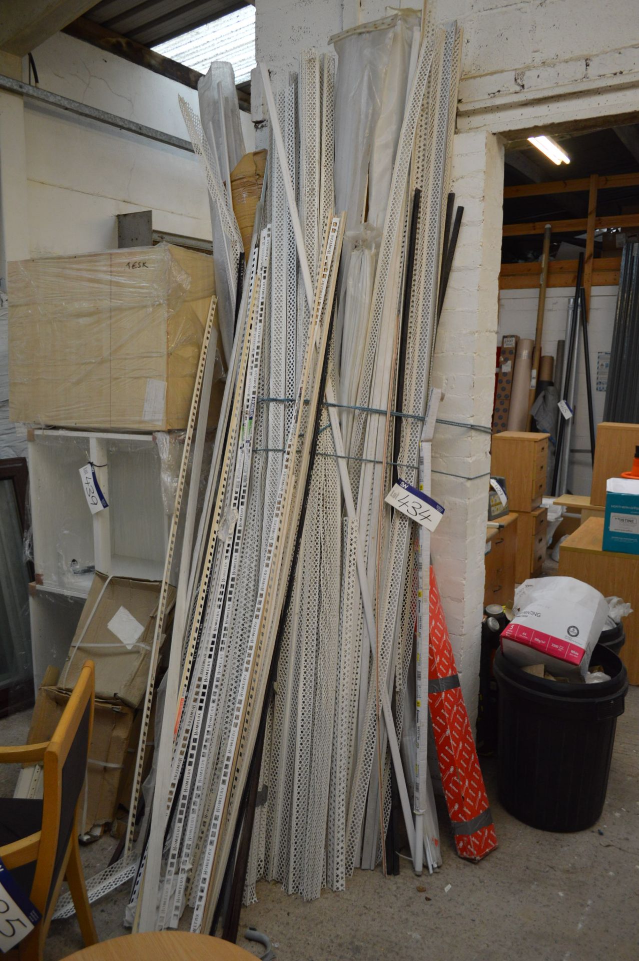 Assorted Steel Angle & Trim, as set out against wa