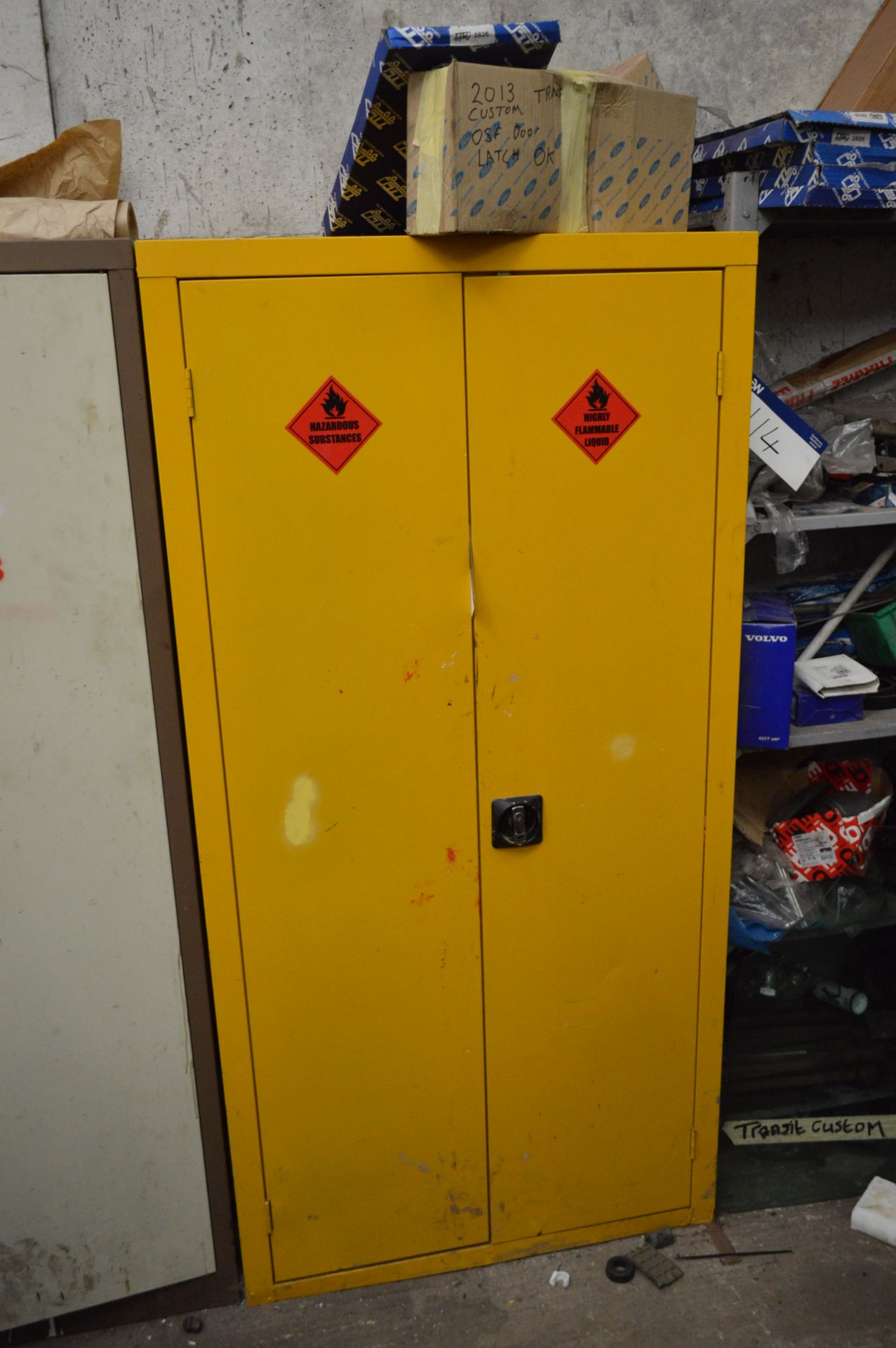 Double Door Steel Cabinet, with contents including