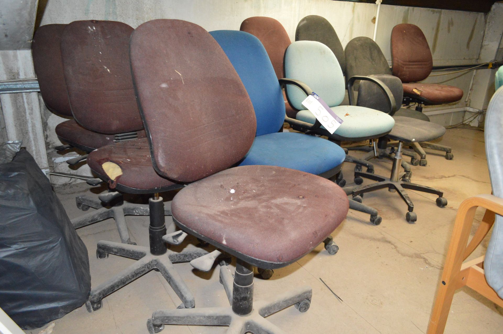 Nine Fabric Upholstered Swivel Chairs