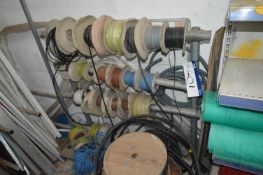 Assorted Wire & Cable Reels, with storage rack, as