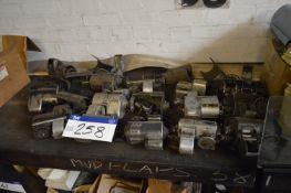 Ticket Machines, with assorted spares and casings as set out on bench