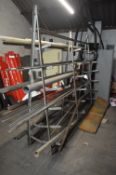 A Framed Steel Stock Rack (contents excluded), approx. 2.8m long