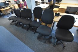 Seven Black Fabric Upholstered Typist Chairs