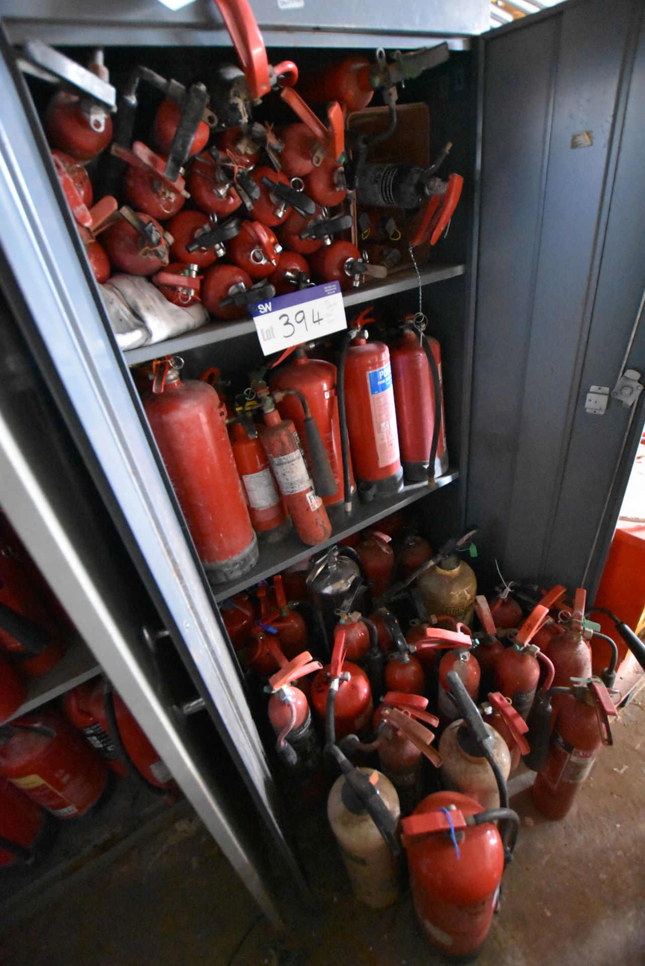 Three double door steel cabinets with contents, including fire extinguishers, and fire - Image 4 of 4