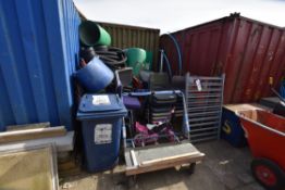 Assorted chairs, bins, flexible piping and equipment as set out in one area