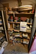 Contents of rack, including tape, sandpaper, sanding belts, wire wool and jointing biscuits, with