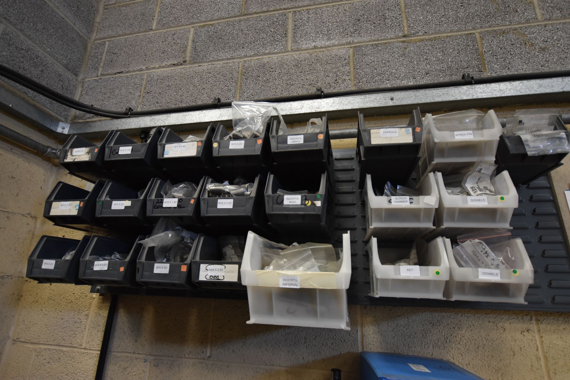 Louvered Wall Racks, with plastic stacking bins an