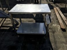 Mobile Stainless Steel Table, approx. 600mm x 900mm x 800mm high, £20 lift out charge