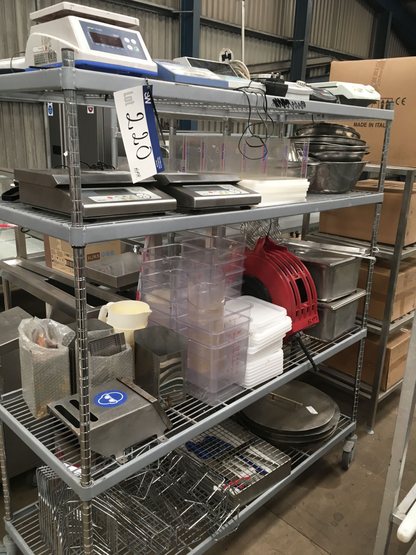 Mobile Rack, including five hot plates, three scales, eight plastic chopping boards, hose reel and