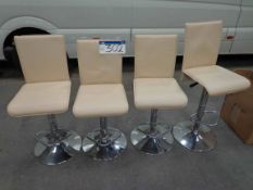 Four Chrome Base Cream Leather Swivel Chairs