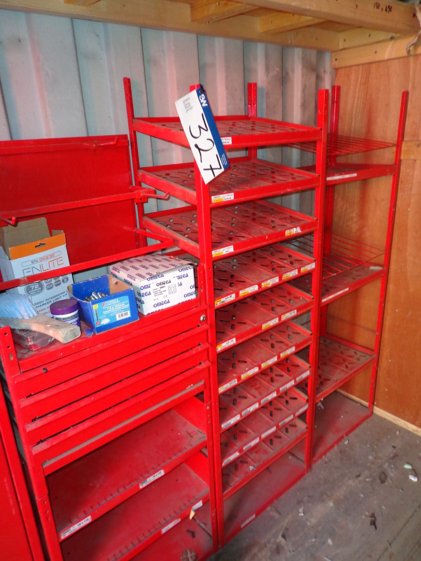 Four Red Steel Shelf Units