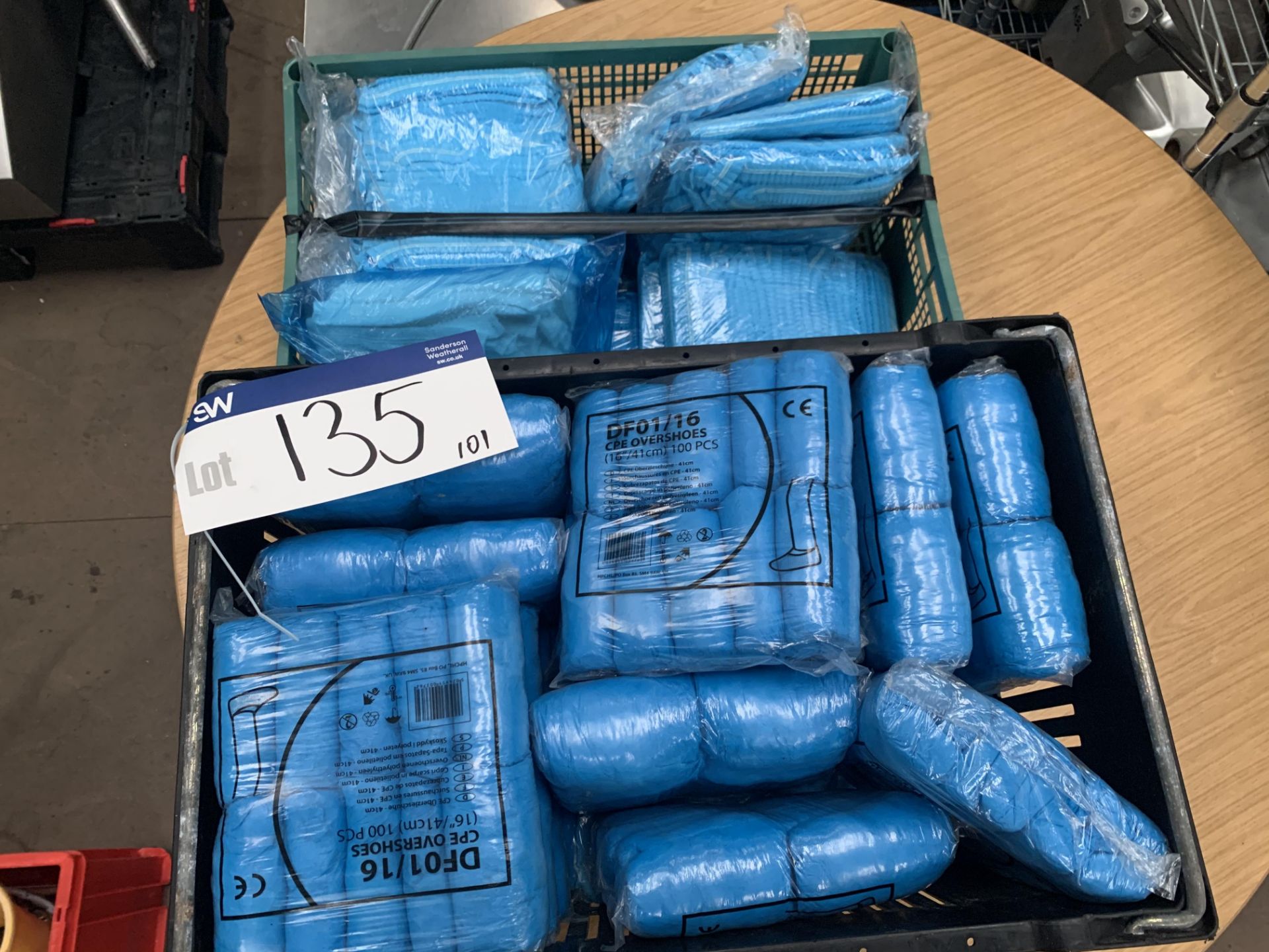 Two Trays, containing 15 packs of overshoe covers