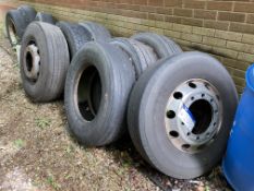 13 Assorted Tyres, as set out against building