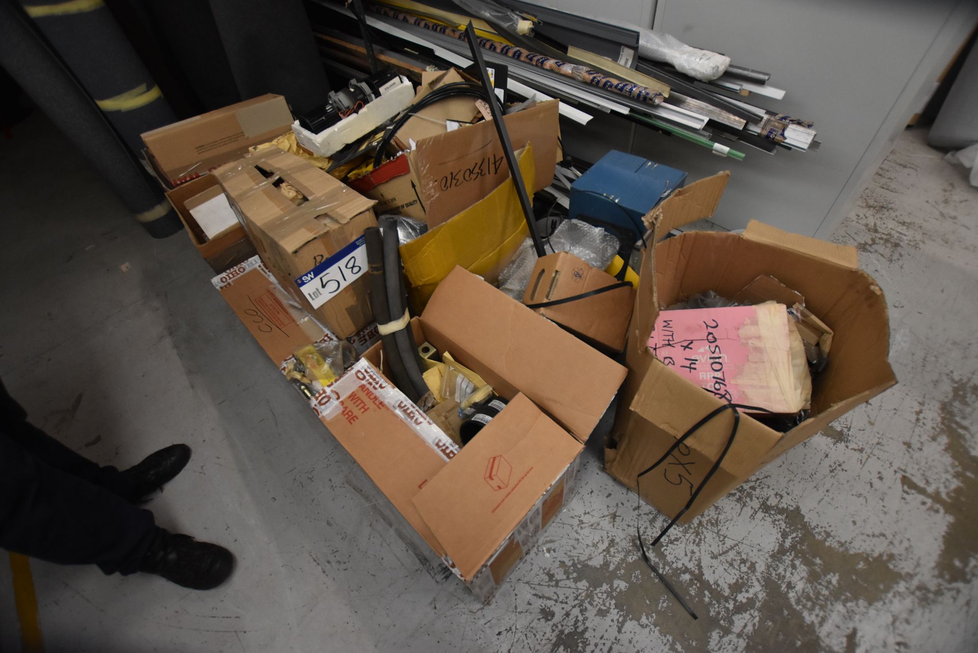 Components, as set out in cardboard boxes (underst