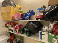 Assorted Children’s Toys including Ride On’s, Footballs etc, as set out on two shelves