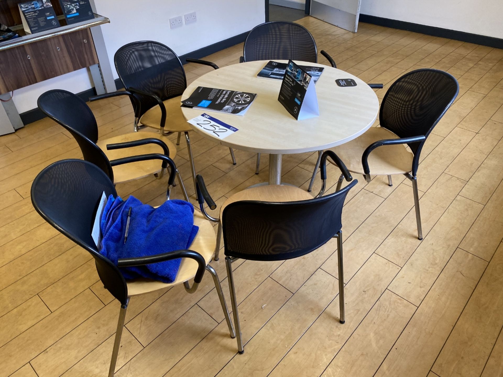 Light Oak Veneered Circular Meeting Table, with six steel framed chairs (lot located at Briscoe