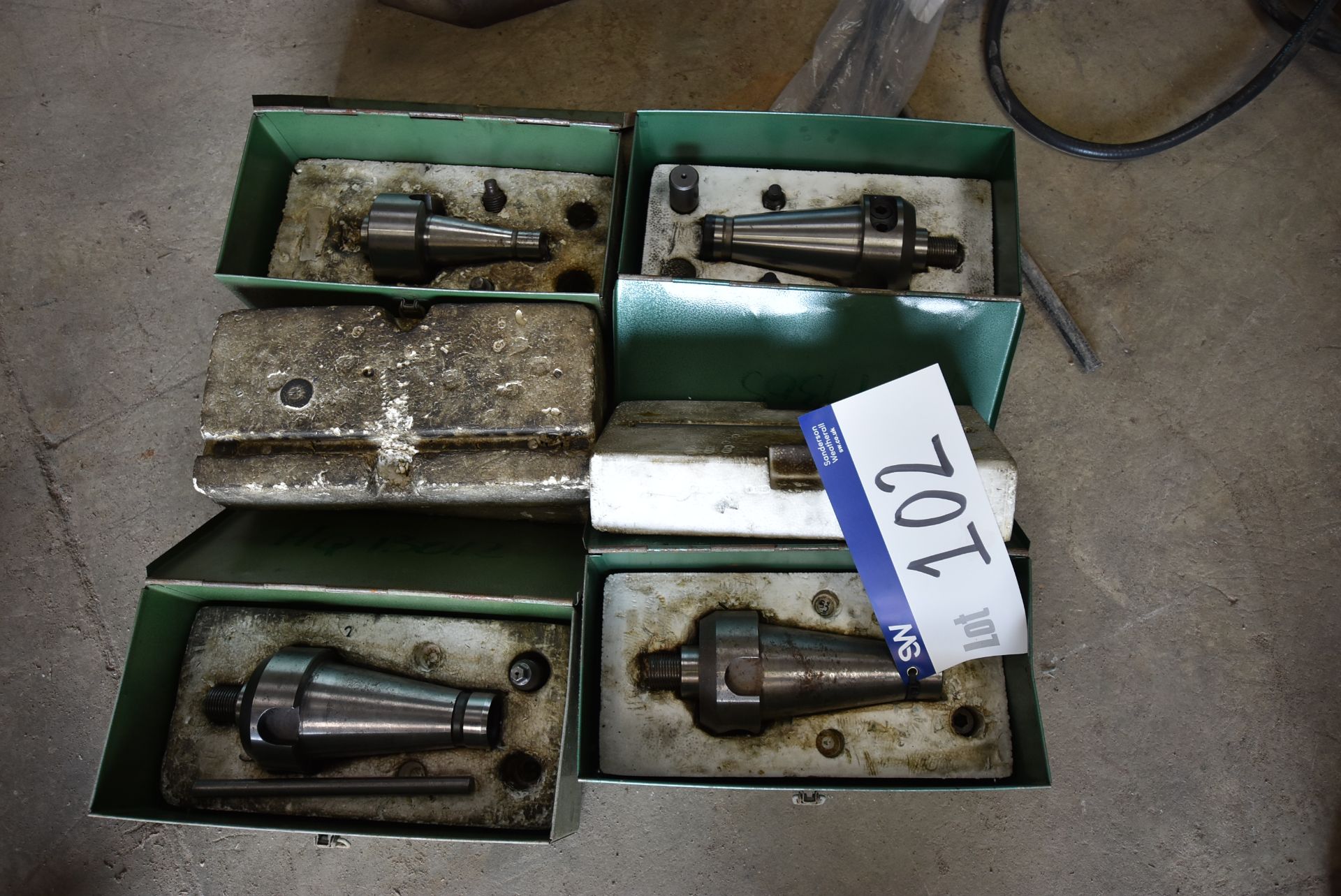 Four Assorted Deadlock Chucks, each in steel case