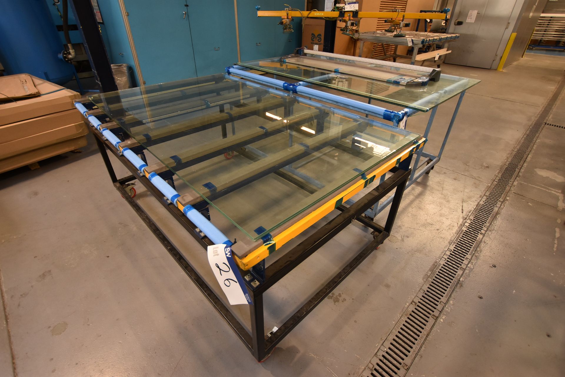 Two Mobile Benches, one 2m x 1.28m x 920mm high and one 1.8m x 1.3m x 980mm high