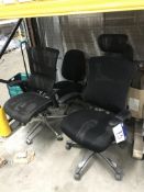 Four Black Upholstered Swivel Office Chairs