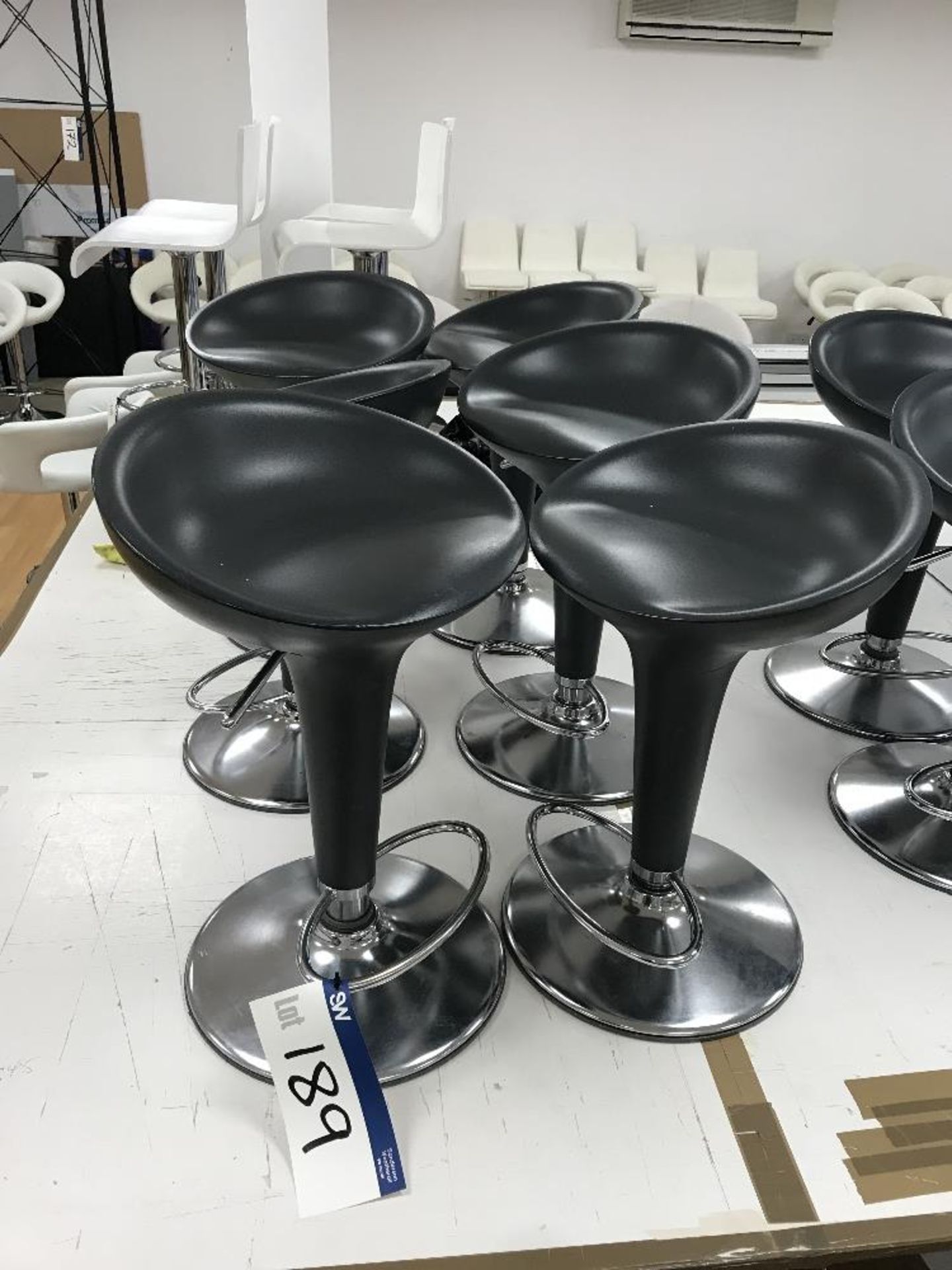 Six Black Plastic Chrome Framed Bar Stools