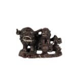 Chinese Wood Carving of a Foo Dog and Her Young