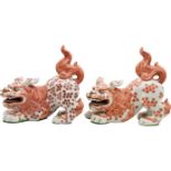 Pair of Porcelain Bowing Foo Dogs