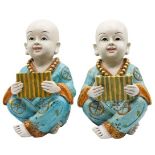 Pair of Buddhist Children Figures