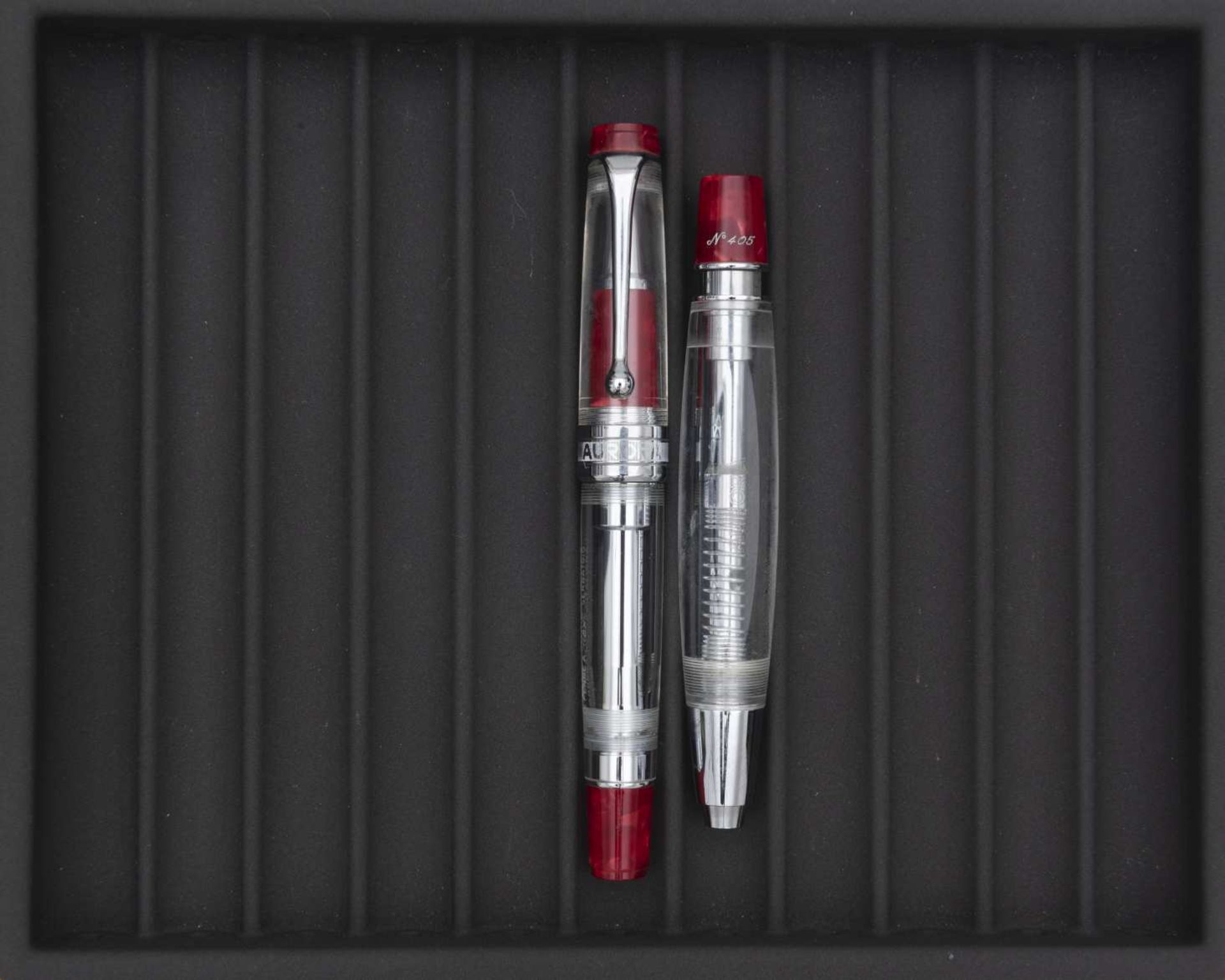 AURORA, Lot de deux stylos Stylo roller Optima Demonstrator (n°308) en résine transparente aux