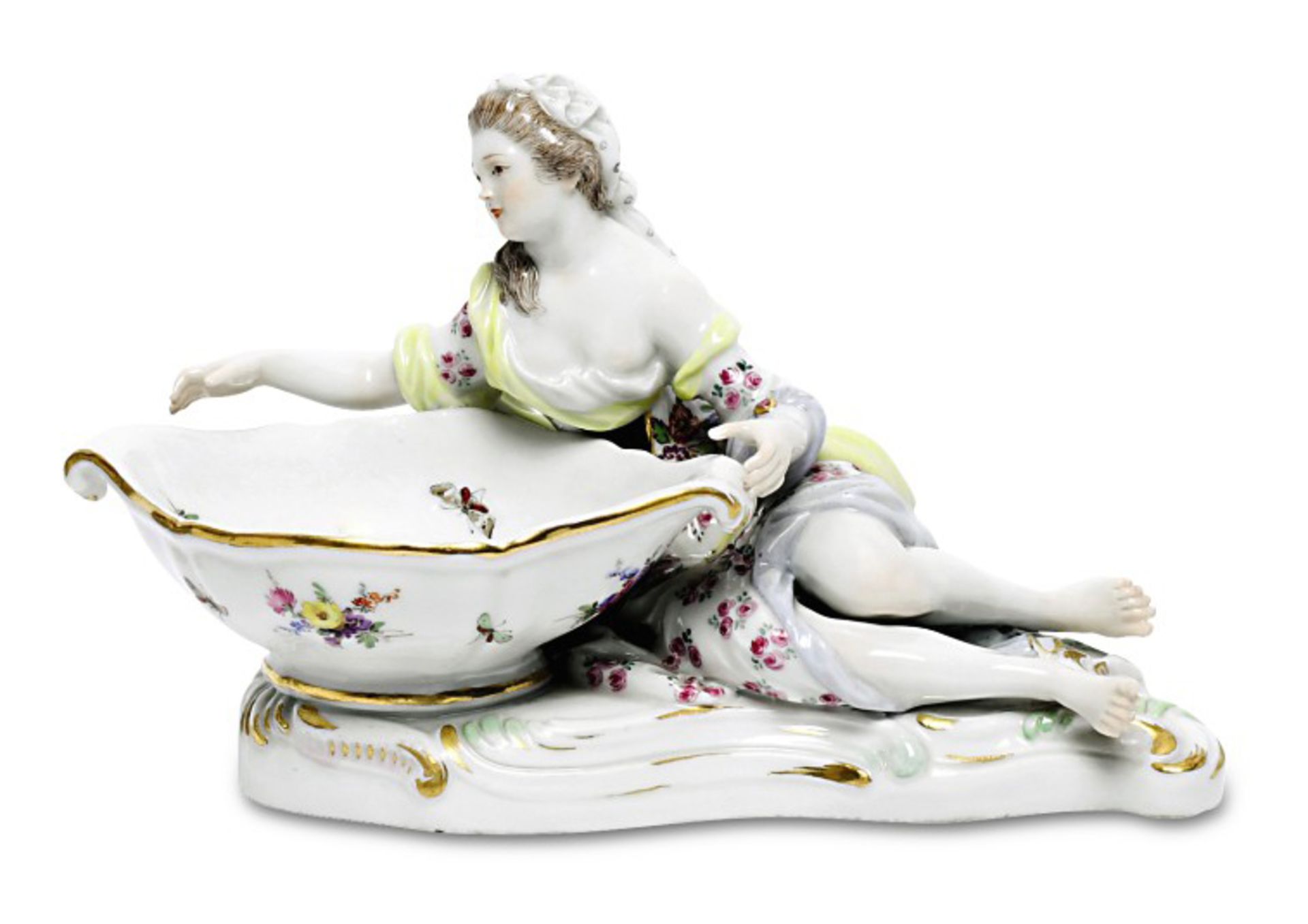 Salière (Figurenschale)Meissen, vor 1924Farb- und Goldstaffage. Liegende Dame mit Schale auf