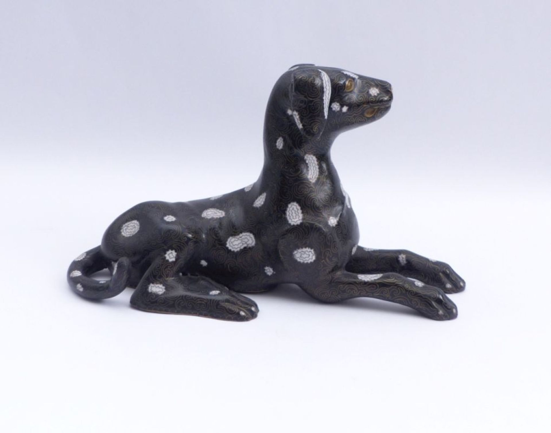 Figure of a resting dog