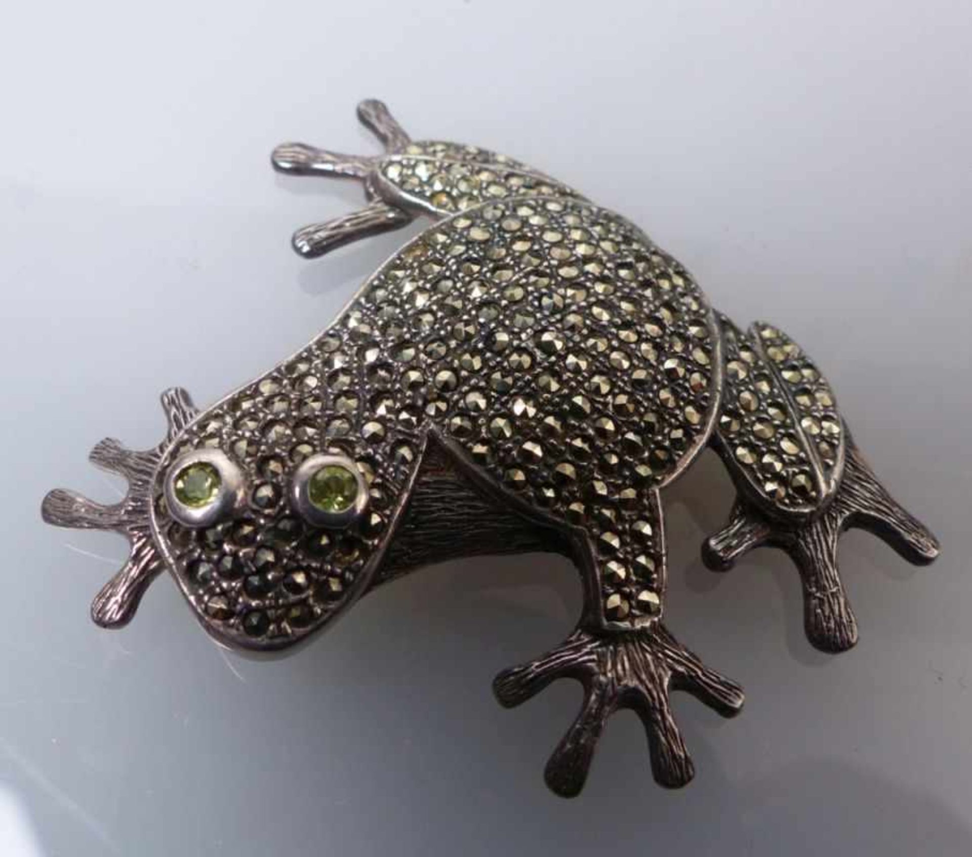 Figurative brooch