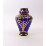 Vase with arabesques in gold