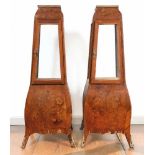 Pair of small showcases as pedestals