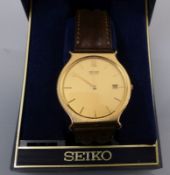 Seiko-Herrenarmbanduhr2. H. 20. Jh.Rundes Gehäuse mit goldfarbenem Zifferblatt, aufgelegter