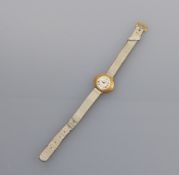 Glashütte-Damenarmbanduhr2. H. 20. Jh.Querovales Gehäuse mit silberfarbenem Zifferblatt, römische